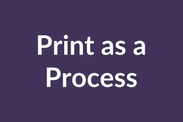 zensmart is showing Text on a purple background that reads "Print as a Process." The text starts small at the top left of the image and gradually enlarges toward the bottom right, creating a sense of movement or progression, much like the print industry's continuous evolution. with print workflow automation