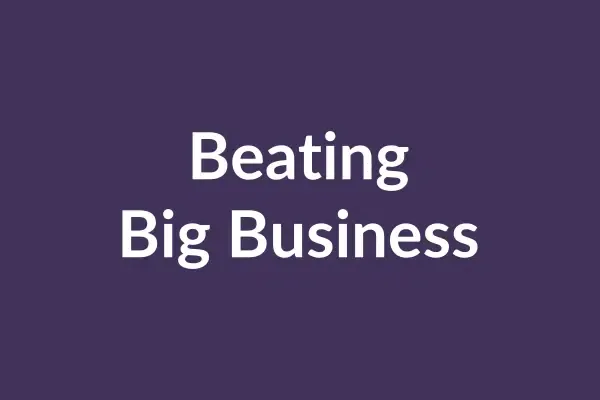 zensmart is showing The image has a purple background with the text "Beating Big Business" written in bold, white font at the center, reminiscent of an auto draft heading. with print workflow automation
